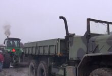 Photo of Video: Tug of War Between a John Deere Tractor and a Military 6X6
